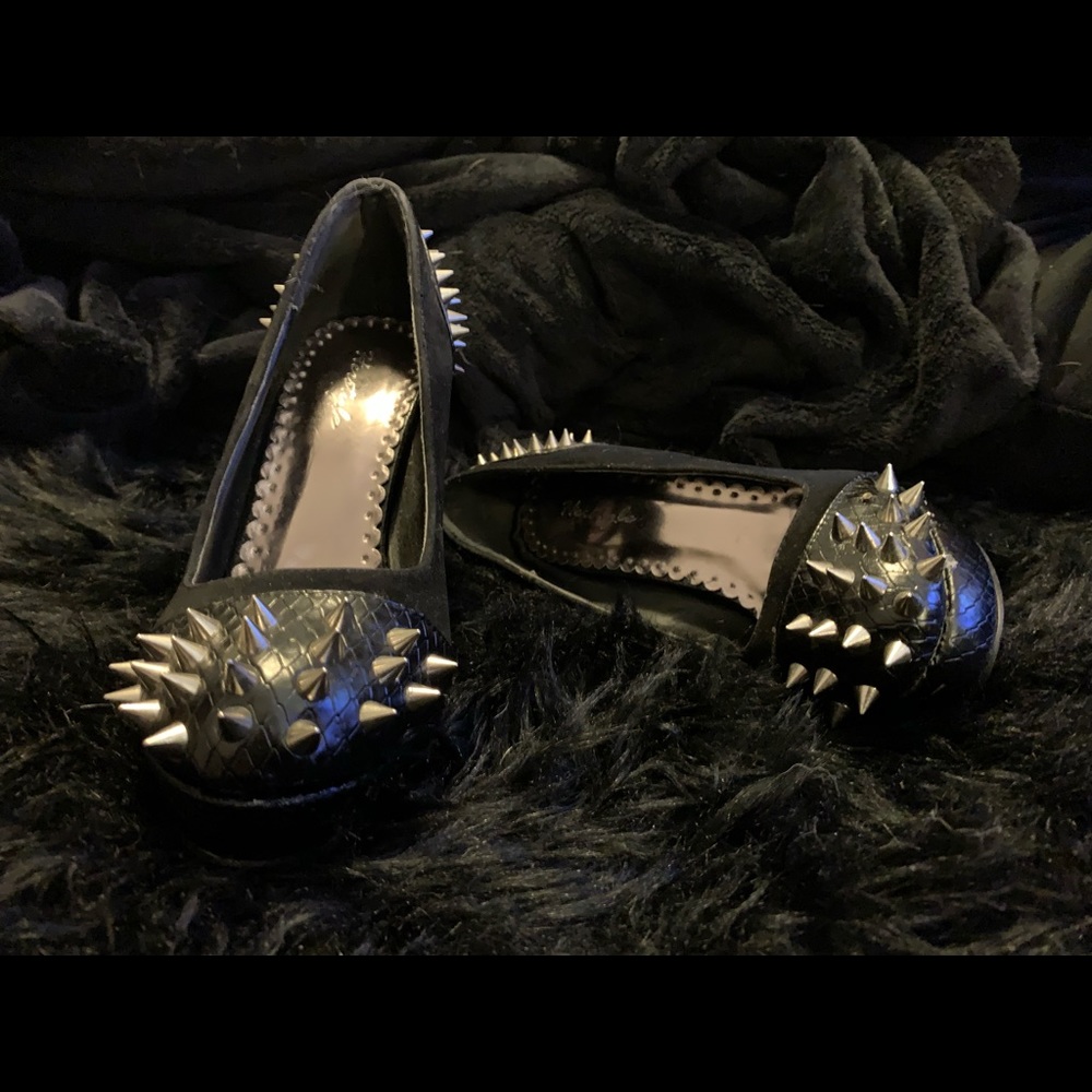 Black spike studded 8 1/2 pump heels
